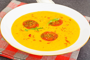 Pumpkin Soup with Carrot and Cherry Tomatoes, Saffron, Dried Her