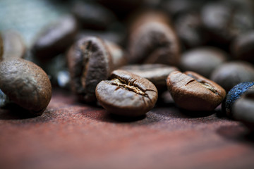 Coffee beans on wood background