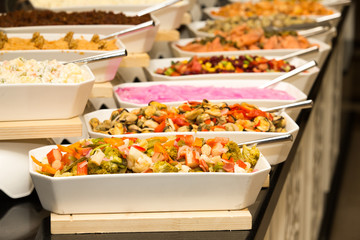 tray of assorted food for salad buffet