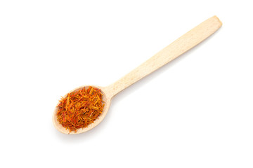 saffron spice in wooden spoon