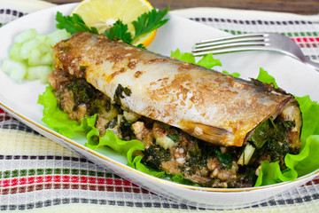 Mackerel Stuffed with Celery and Parsley in a Sauce of Coconut M