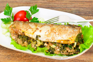Mackerel Stuffed with Celery and Parsley in a Sauce of Coconut M