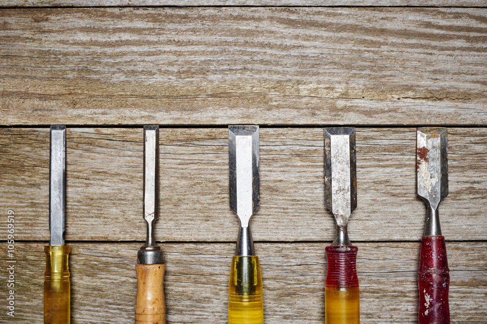 Wall mural old tools on a wooden table