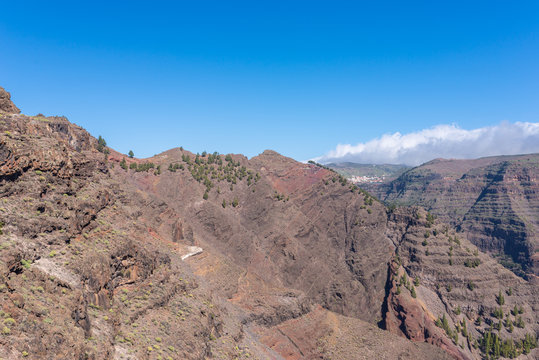 La Gomera. Trail over the Barranco de Arure. The Barranco de Arure is a side valley from the Valle Gran Rey. The long distance trail to the village Arure leads over the left altitude of the Ravine