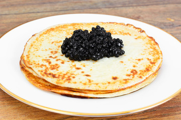 Pancakes with Black Caviar