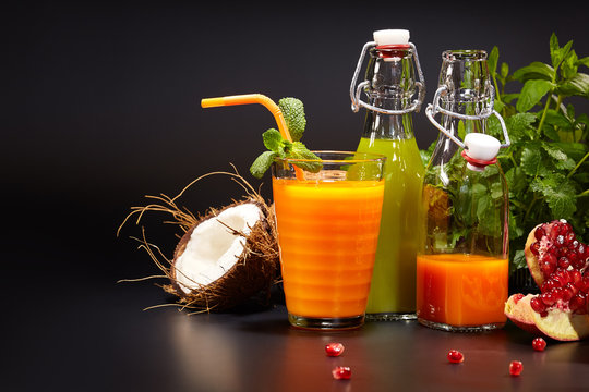 Glasses with fresh vegetable juices isolated on black. Detox 