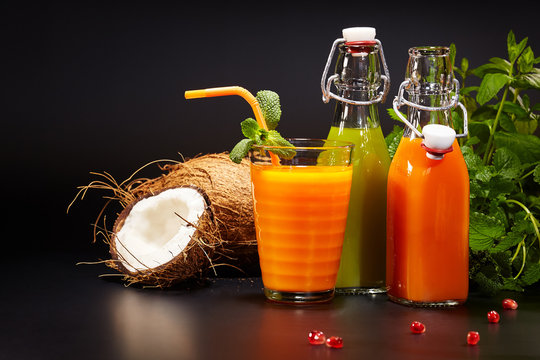 Glasses with fresh vegetable juices isolated on black. Detox 