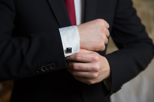 businessman wearing cufflinks