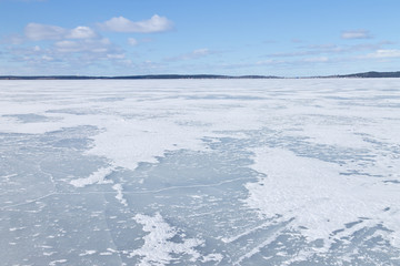 The surface of the lake covered with ice