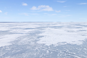 Frozen northern lake on a clear winter day