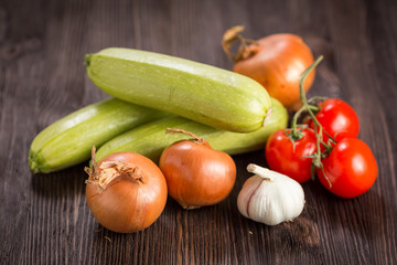 Vegetables on a dark wooden background
