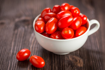 Cherry tomatoes on a wooden table