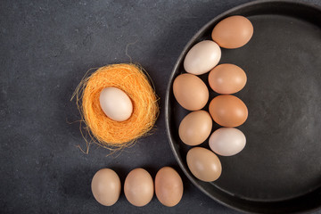 Easter eggs  on wooden background. Top view. 