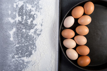 Easter eggs  on wooden background. Top view. 
