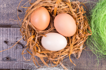 Easter eggs  on wooden background. Top view. 
