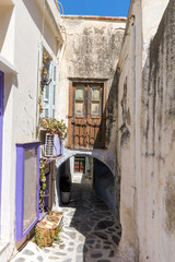 Small street in Chora town, Naxos Island, Cyclades, Greece - obrazy, fototapety, plakaty