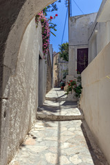 Fototapeta na wymiar Small street in the fortress in Chora town, Naxos Island, Cyclades, Greece