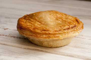 Cooked Pie on a Smooth Wooden Surface