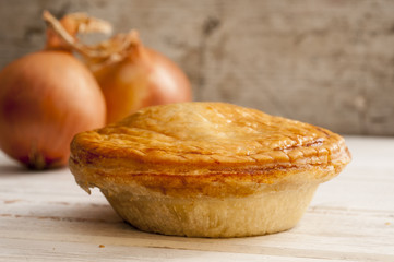 Cooked Pie and a Pair of Onions