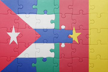 puzzle with the national flag of benin and cameroon