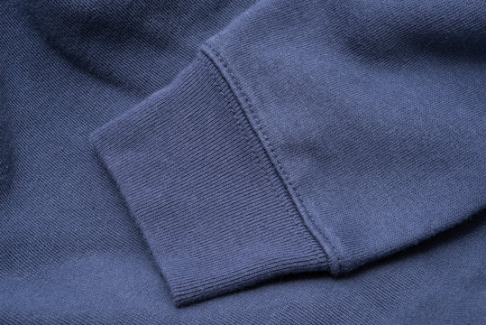 Sleeve of Blue Sweatshirt