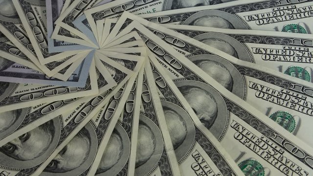 Rotating US dollars banknotes business background. Seamless Looping Motion.