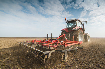 Tractor preparing land for sowing