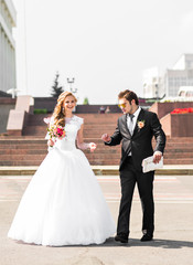 Romantic wedding couple having fun together outdoor in nature