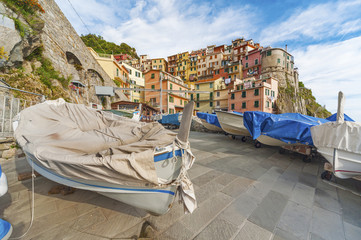 Obraz premium Boat for Rent at resort village Riomaggiore in Cinque Terre, Liguria, Italy