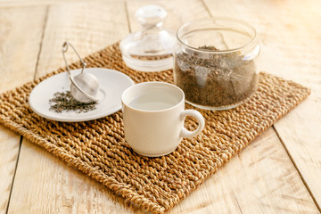 Fototapeta na wymiar Tea set on the wooden table at sunny morning