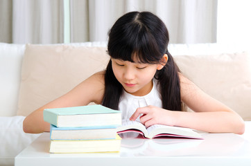 Asian child reading