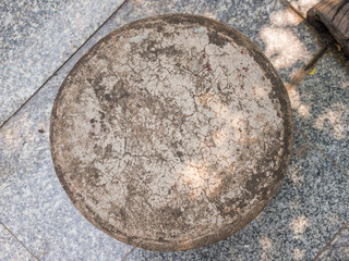 Top view old gray stone chair