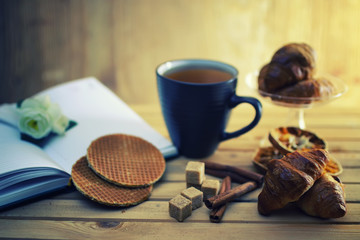 tea cup croissant book