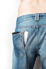 a man wear jeans with trace of theif slitting on it