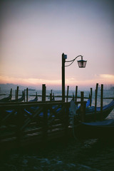 Lantern on the coast of a gondola, at dusk