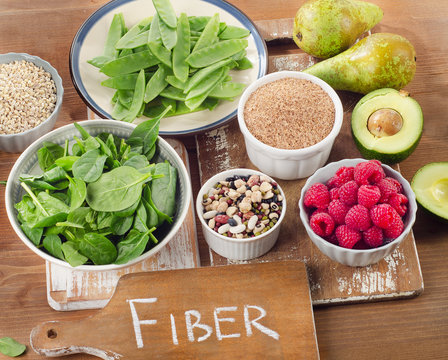 Foods rich in Fiber on  wooden background.