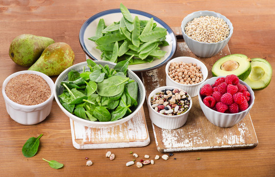 Foods rich in Fiber on a wooden background.