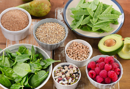 Foods rich in Fiber on wooden table.