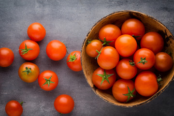 Tomato on the gray background.