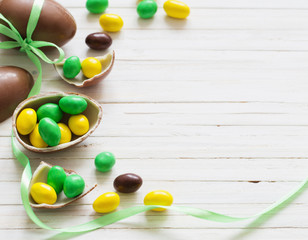 Chocolate Easter Eggs Over Wooden Background