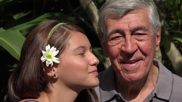 Teen Girl Kisses Grandfather