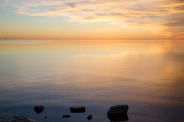 Fototapeta na wymiar Waterfront view by sunset
