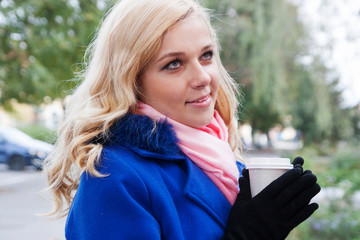 blonde woman with coffee