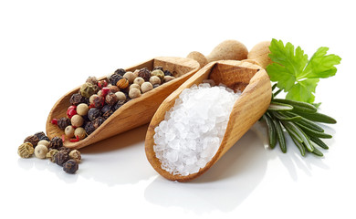 Salt and pepper on white background