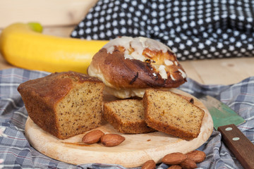 Homemade banana bread sliced on a table . rustic style