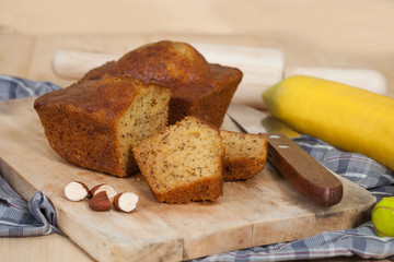 Homemade banana bread sliced on a table . rustic style