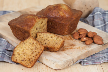 Homemade banana bread sliced on a table . rustic style