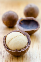 macadamia nuts on wooden.