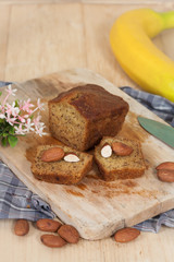 Homemade banana bread sliced on a table . rustic style