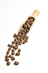 Brown coffee beans isolated on white